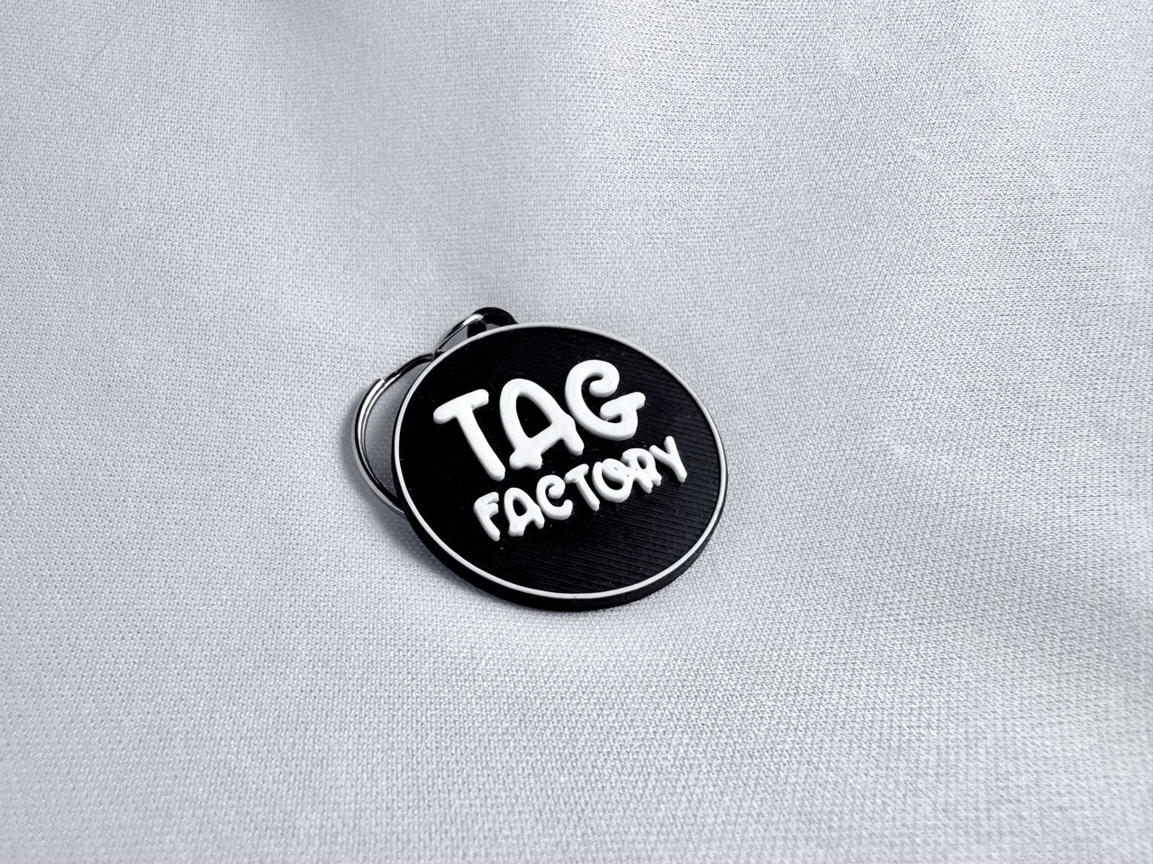 gepersonaliseerde sleutelhanger met logo